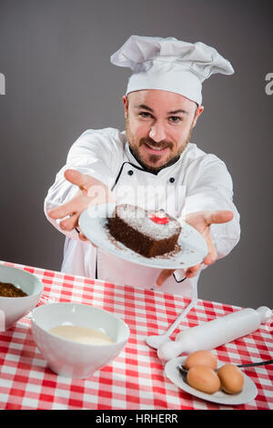 Kuchenbaecker - cake baker Stock Photo