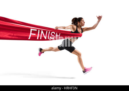 Winner woman runner on the finish line Stock Photo