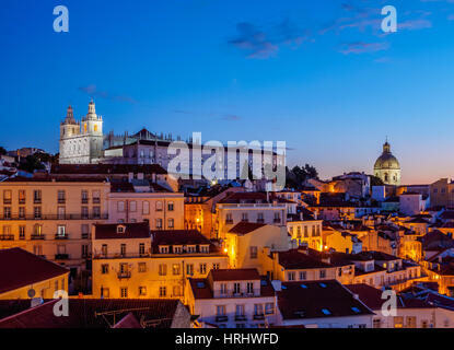 Miradouro das Portas do Sol, twilight view over Alfama Neighbourhood towards the Sao Vicente de Fora Monastery, Lisbon, Portugal Stock Photo