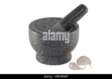 Mortar and Pestle with Two Garlic Cloves Isolated on a White Background Stock Photo