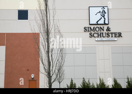 A logo sign outside of a Simon & Schuster, Inc., distribution warehouse in Riverside, New Jersey, on February 26, 2017. Stock Photo