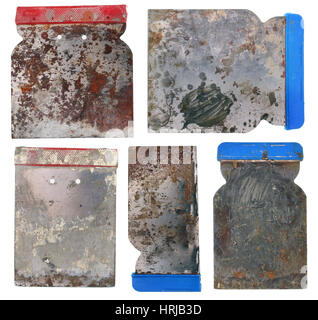 Set of old dirty rusty construction steel  spatulas. Isolated Stock Photo