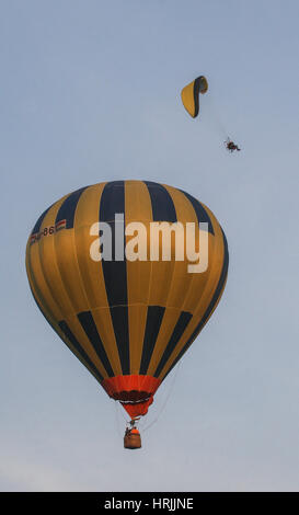Campul Cetatii, Mures county, Romania, September 27, 2009: A hot air balloon and a skygliding are seen in the air  at the Hot Air Balloons Festival in Stock Photo