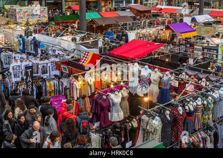 Old Spitalfields Market in East London, on a popular Sunday morning is packed with artisans and traders offering all kinds of merchandise, England UK Stock Photo