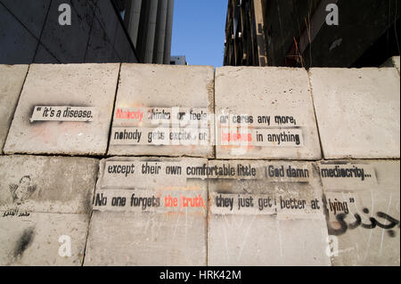 EGYPT, CAIRO: Since the revolution began in January 2011 many walls have been errected to stop protesters advancing on ministries, foreign embassies a Stock Photo