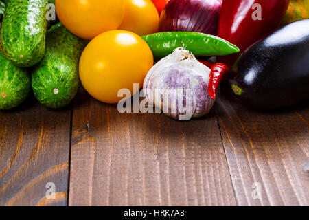 Photography of different vegetables on old wooden table Stock Photo