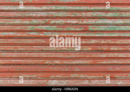 Wall with the old boards with shabby red paint. Nice element for background Stock Photo