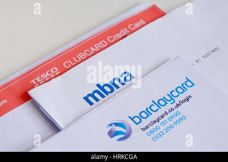 Stack of credit card statements including Tesco Bank, Barclaycard and ...
