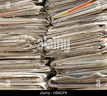 heap of many newspapers already read for the collection of used paper Stock Photo