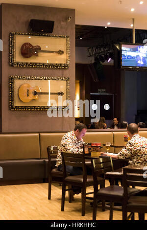 Diners in the Hard Rock Cafe. Medellin, Colombia. Stock Photo