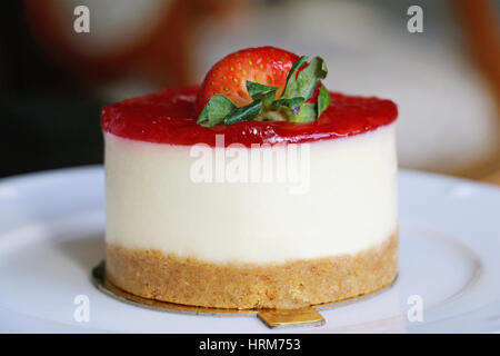 mini round strawberry cheesecake close view Stock Photo