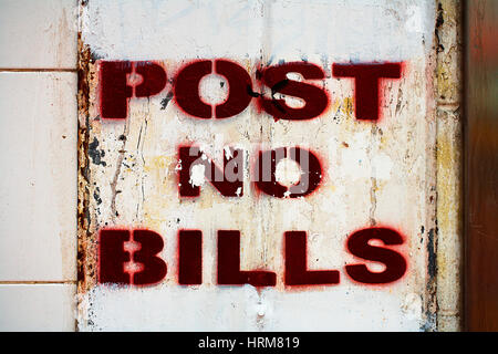 Stencilled post no bill sign Stock Photo
