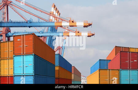 export import cargo containers bulk in port with cranes Stock Photo