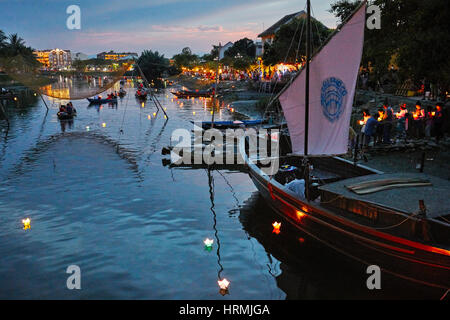 Lanterns floating on Thu Bon River during Full Moon Lantern Festival. Hoi An, Quang Nam Province, Vietnam. Stock Photo