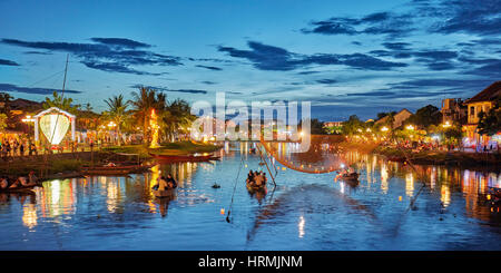 Lanterns on Thu Bon River at dusk. Hoi An Ancient Town, Quang Nam Province, Vietnam. Stock Photo