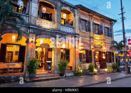 Building in Hoi An Ancient Town illuminated at dusk. Hoi An, Quang Nam Province, Vietnam. Stock Photo