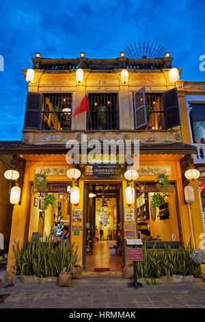 Old house in Hoi An Ancient Town illuminated at dusk. Hoi An, Quang Nam Province, Vietnam. Stock Photo