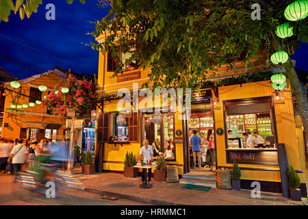 Buildings in Hoi An Ancient Town illuminated at dusk. Hoi An, Quang Nam Province, Vietnam. Stock Photo