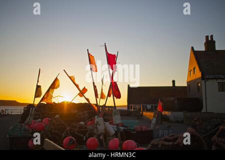 red marker flags and buoys for lobster and crab pots at Mudeford Quay Stock Photo