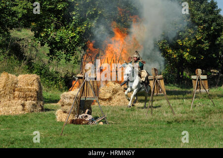 CLUJ-NAPOCA, ROMANIA - OCTOBER 3: Members of Eagles of Calata Nomadic group performing a free equestrian demonstration with Hunnic and archaic Hungari Stock Photo