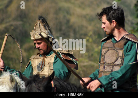 CLUJ-NAPOCA, ROMANIA - OCTOBER 3: Members of Eagles of Calata Nomadic group performing a free equestrian demonstration with Hunnic and archaic Hungari Stock Photo