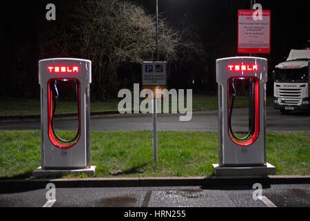 Bristol, UK. 02nd Mar, 2017. New Tesla Electric Charging points for Tesla Model S. A row of many seen at Gordano Services M5. The charging points have a dynamic over-current protection, wet cable and anti theft cable. Credit: Robert Timoney/Alamy Live News Stock Photo