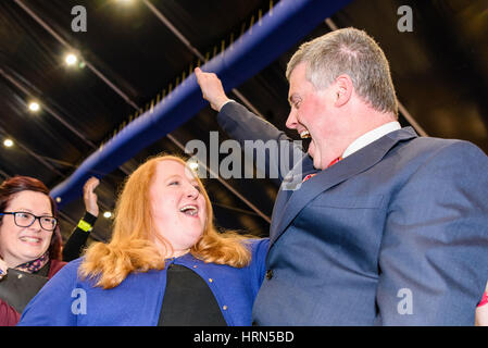 Belfast, Northern ireland. 03 Mar 2017 - Northern Ireland Assembly Election. Naomi Long (Alliance Party) is elected on the first count and celebrates with her husband, Belfast City Councillor Michael Long. Stock Photo