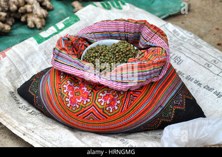 SAPA, VIETNAM - FEBRUARY 23, 2013: A bag full with dried peas on sale in the rural mountain market of Sapa, Vietnam Stock Photo