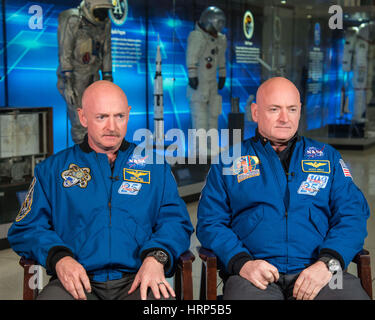 Houston Texas at the Johnson Space Center Expedition 45/46 Commander, Astronaut Scott Kelly along with his brother, former Astronaut Mark Kelly speak to news media on January 19, 2015 about Scott Kelly's 1-year mission aboard the International Space Station. Scott Joseph Kelly (born February 21, 1964) is an American astronaut, engineer and a retired U.S. Navy Captain. A veteran of three previous missions, Kelly was selected along with Mikhail Korniyenko in November 2012 for a special year-long mission to the International Space Station. Kelly commanded the International Space Station (ISS) on Stock Photo