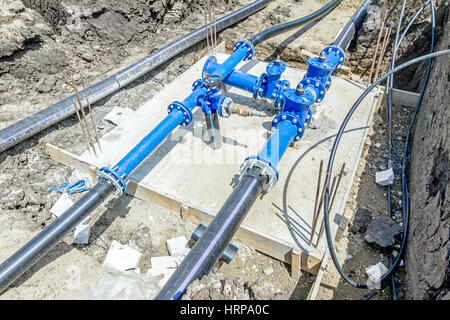 Master valve for water supply system, junction place with hdpe pipeline. Stock Photo