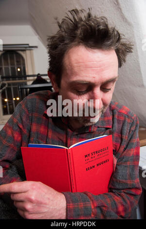 Comedian and writer Sean Hughes at The Red Imp Comedy Club @ The Rose and Crown Pub Walthamstow, London E17.   Red Imp is an independent comedy club founded and hosted by comedian Susan Murray it attracts a wealth of A list comedy talent many of whom use the venue as an opportunity to test out new material. Stock Photo