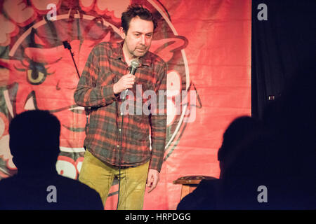 Comedian and writer Sean Hughes at The Red Imp Comedy Club @ The Rose and Crown Pub Walthamstow, London E17.   Red Imp is an independent comedy club founded and hosted by comedian Susan Murray it attracts a wealth of A list comedy talent many of whom use the venue as an opportunity to test out new material. Stock Photo