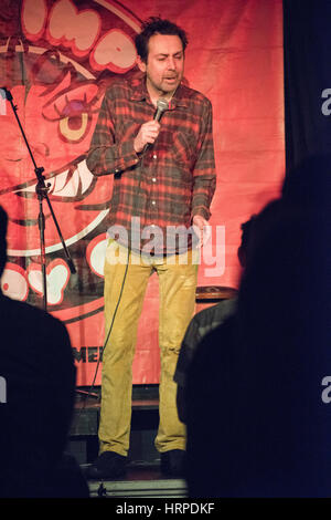 Comedian and writer Sean Hughes at The Red Imp Comedy Club @ The Rose and Crown Pub Walthamstow, London E17.   Red Imp is an independent comedy club founded and hosted by comedian Susan Murray it attracts a wealth of A list comedy talent many of whom use the venue as an opportunity to test out new material. Stock Photo