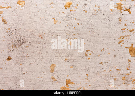 Old cement plastered wall that has chipped paint. Stock Photo