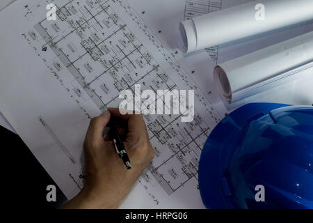 Workplace of architect - Architect rolls and plans.architectural plan,technical project drawing. Engineering tools view from the top. Construction bac Stock Photo