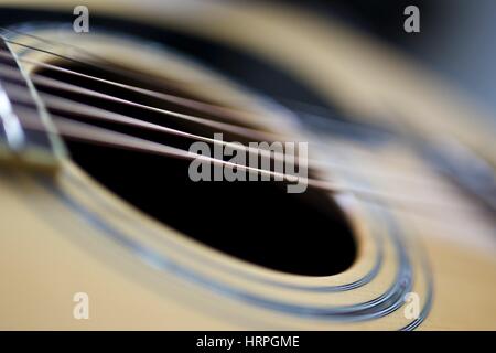 detail of six string Yamaha LLX16 electro acoustic guitar with solid spruce top and solid rosewood back and sides close up Stock Photo