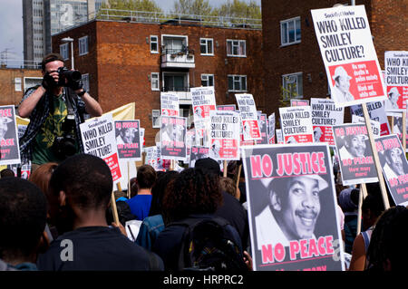 People marching in London in 2011, following the death of DJ Smiley Culture while under police arrest Stock Photo