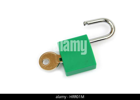 Green padlock, unlocked with key, on white background Stock Photo