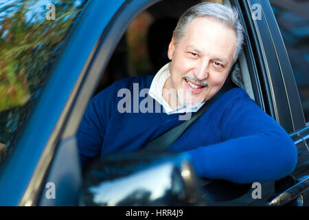 Man driving his car Stock Photo