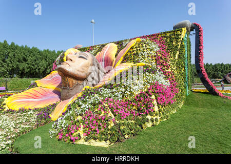 DUBAI, UAE - NOV 27, 2016: Female face sculpture at the Miracle Garden in Dubai. United Arab Emirates, Middle East Stock Photo