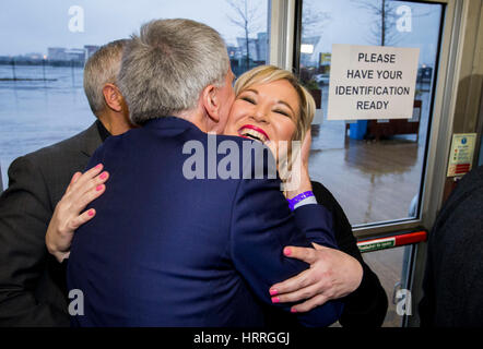 Sinn Fein Leader in the North Michelle O'Neill is greeted by returned Sinn Fein MLA Mairt’n O Muilleoir as arrives at the Titanic Exhibition Centre, Belfast for the 2017 Northern Ireland Assembly election count. Stock Photo