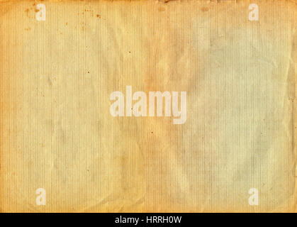 Old paper sheet in a vertical strip. Crumpled sheet of vintage paper with clear linear structure. Design paper texture for beautiful background Stock Photo