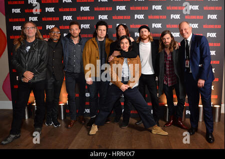 Cast and crew (L - R) Director Greg Nicotero, Seth Gilliam, Ross Marquand, Josh McDermitt, Norman Reedus, Alanna Masterson, Austin Amelio, Tom Payne and Jeff Ford attending Fox's A Night with the Walking Dead at the Hamyard Hotel, Soho, London. Stock Photo