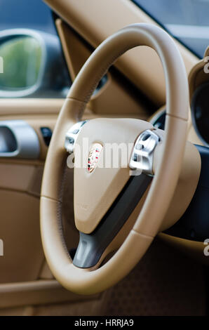 Kyiv, Ukraine - April 4th, 2014: Steering wheel of Porsche Cayman Stock Photo