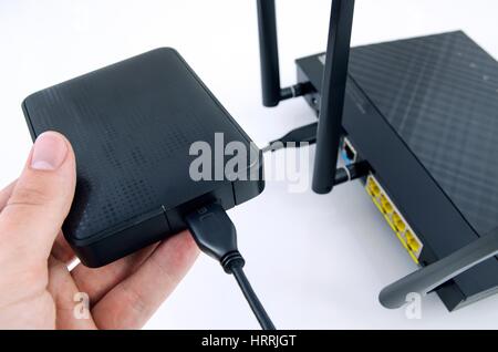 Router with backup storage disk. DLNA media server from USB disk Stock Photo