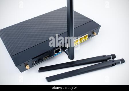 Modern wireless wi-fi router isolated on white background. Stock Photo