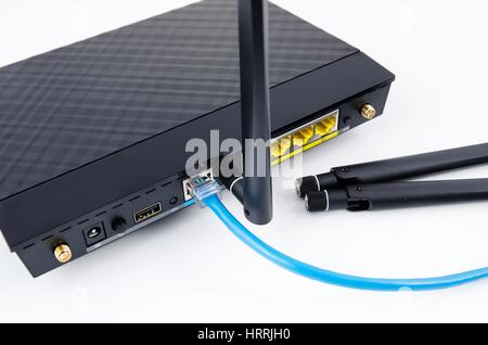 Modern wireless wi-fi router isolated on white background. Stock Photo