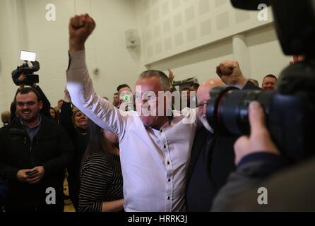 Sinn Fein candidate for Fermanagh South Tyrone Sean Lynch celebrates at the Omagh count centre having been deemed elected in Northern Ireland's Assembly election. Stock Photo