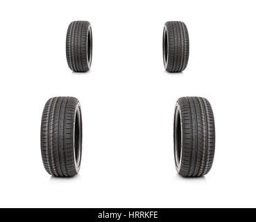 Four summer new car tires. Summer car tires driving on a virtual road. Stock Photo