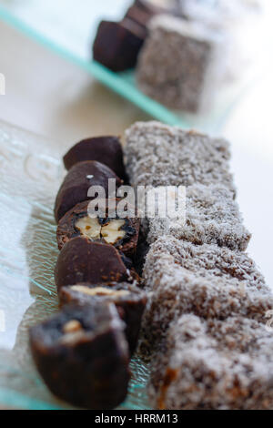 Colorful and delicious home made chocolate cakes arranged on glass plate for celebration of the Saint day Stock Photo